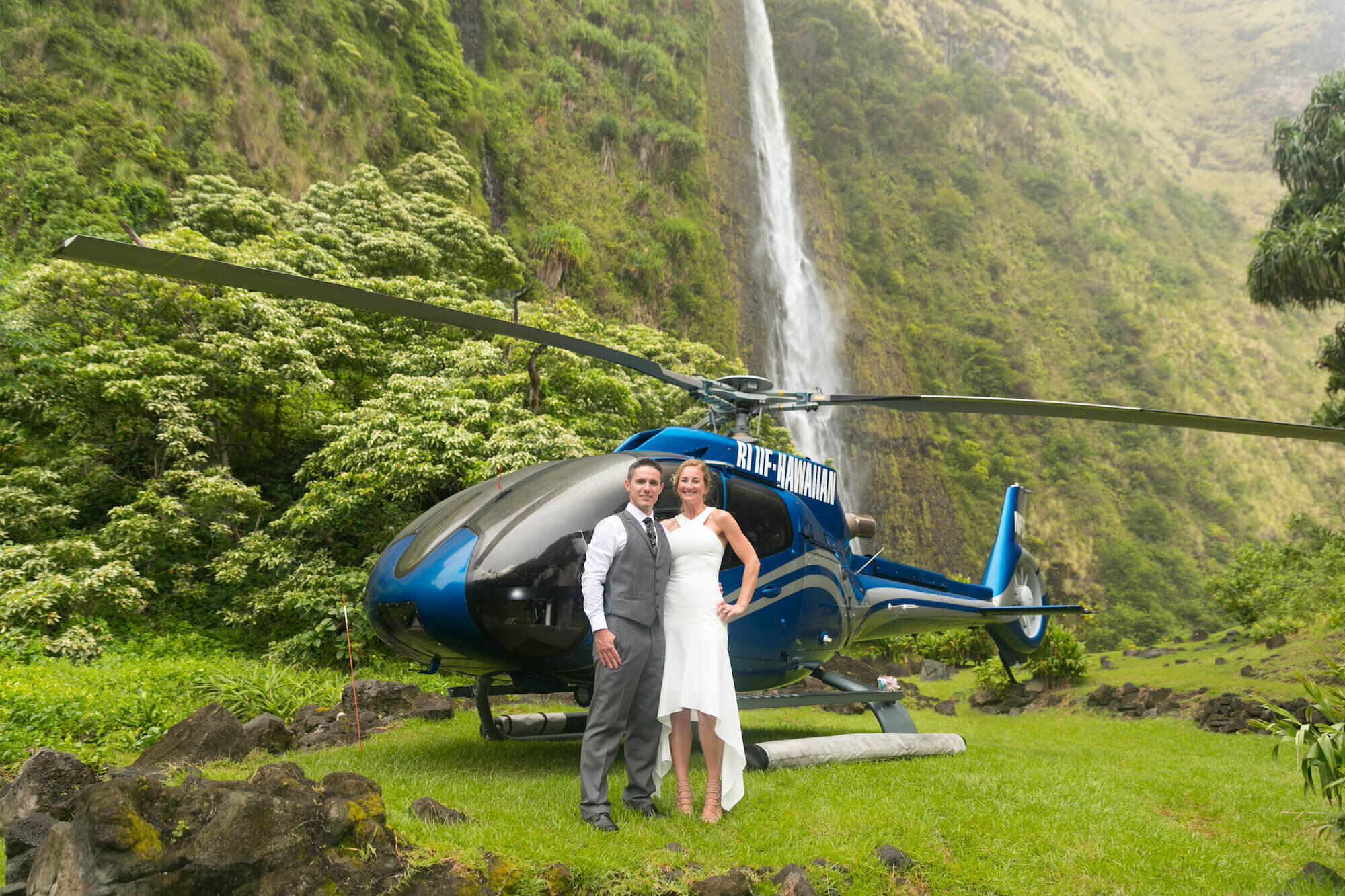 3000 foot tall sea cliffs tower above the ocean, and the tallest waterfall in the state of hawaii . Helicopter Dream Wedding Beach Glass Weddings